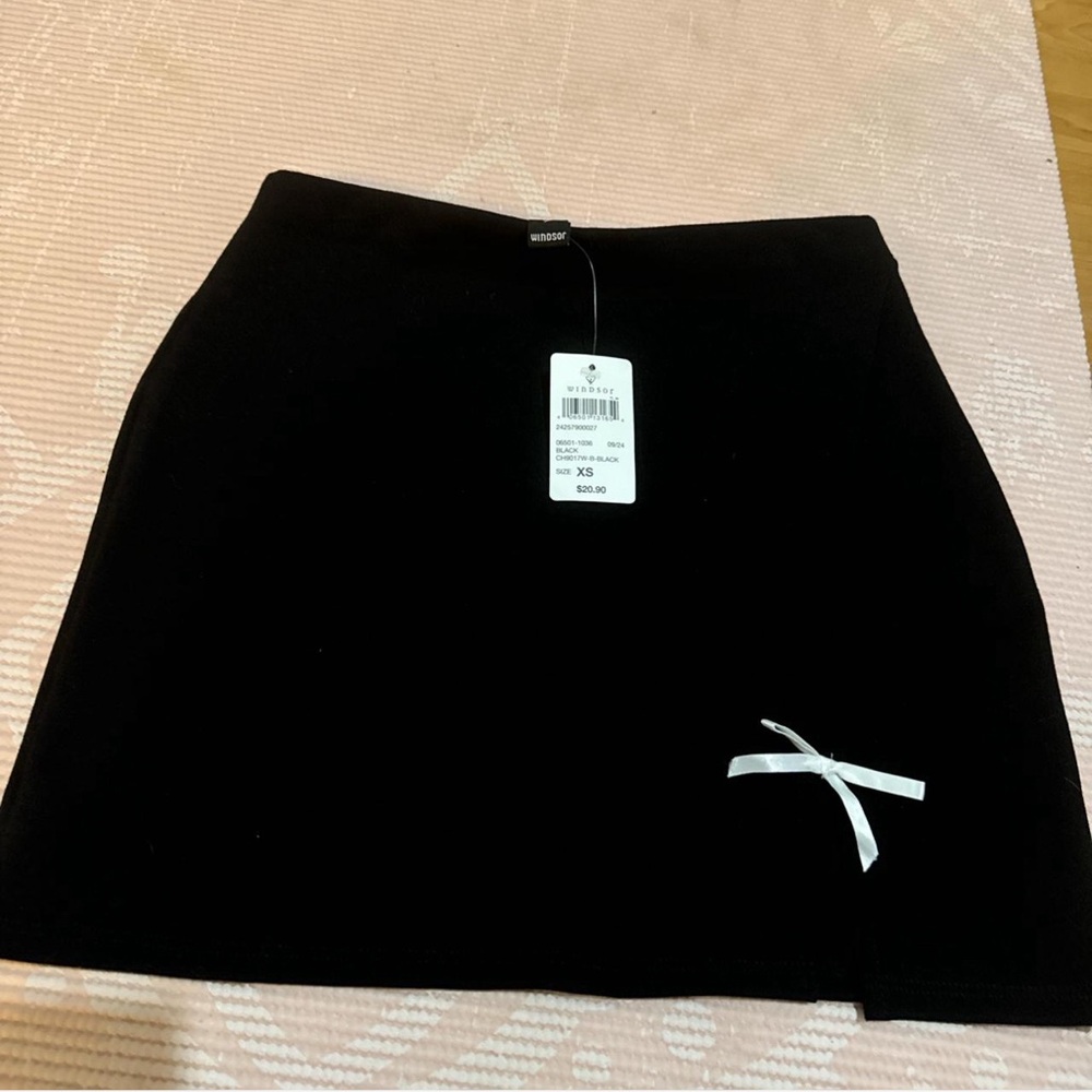 Windsor black mini skirt with white bow detail